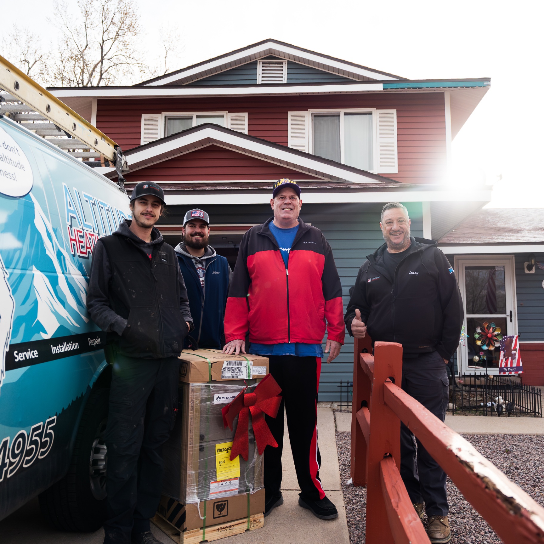 Greg from Colorado Springs receiving his free furnace from the Altitude Heating & Air team